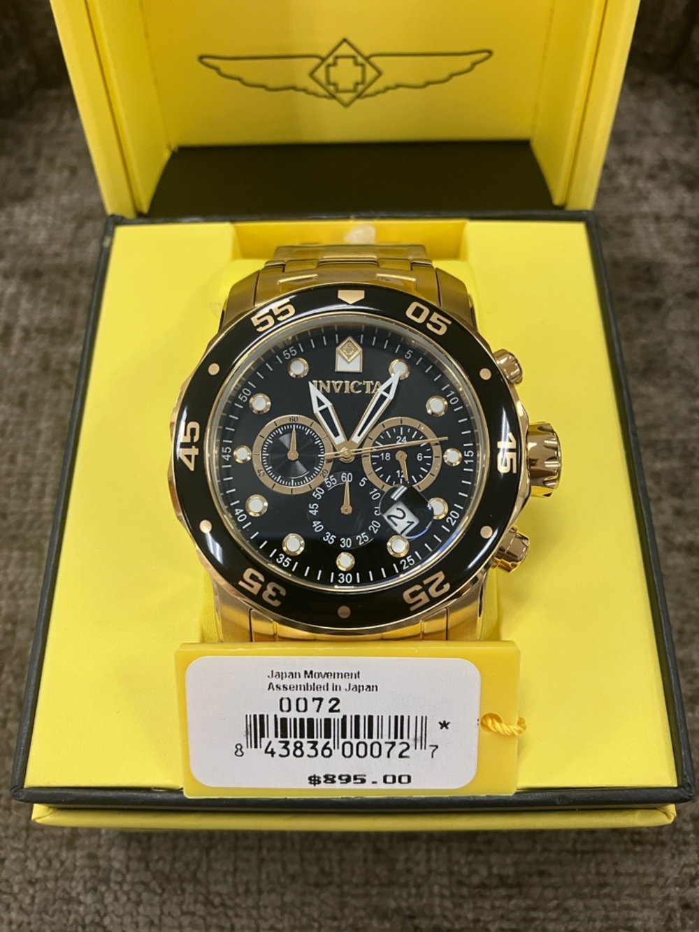 Invicta Gold and Black Stainless Steel Chronograph Watch